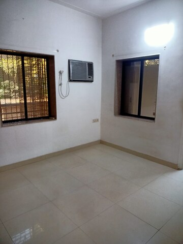Room in 2 BHK Apartment at Meethi Hill Crest Apartment, Bandra West – for Rent