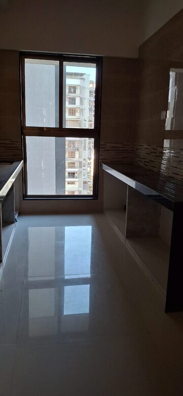 Kitchen in 2 BHK Apartment at Rajesh Raj Infinia, Malad West – for Rent
