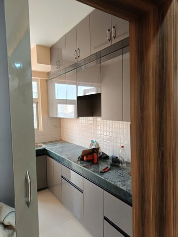 Kitchen in 2 BHK Apartment at Shree Vardhman Green Court, Sector 90 – for Rent