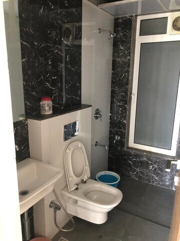 Bathroom in 2 BHK Apartment at Courtyard by Narang Realty and The Wadhwa Group, Pokhran Road No Two – for Rent