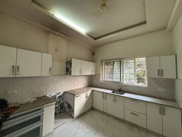 Kitchen in 2 BHK Apartment at Ansal Valley View Estate, Gwal Pahari – for Rent