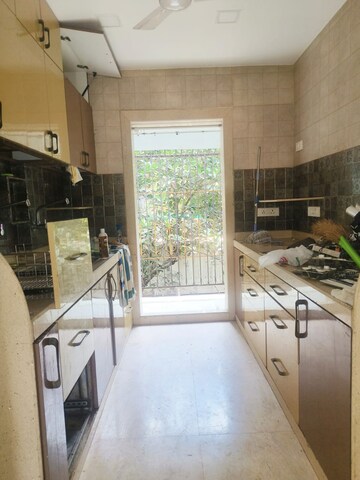 Kitchen in 2 BHK Apartment at Golden Rock, Bandra West – for Rent