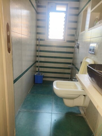 Bathroom in 2 BHK Apartment at Golden Rock, Bandra West – for Rent