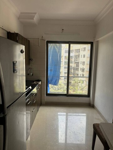 Kitchen in 2 BHK Apartment at JanKalyan CHS, Goregaon West – for Rent