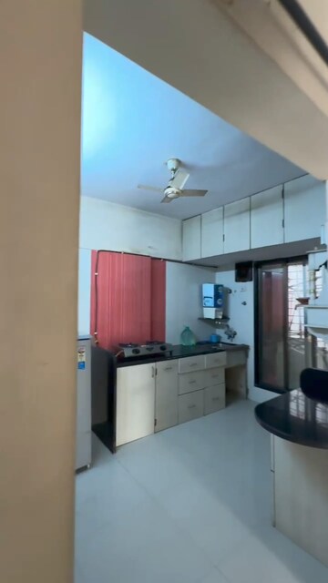 Kitchen in 2 BHK Apartment at Swarna Apartments, Mira Road – for Rent