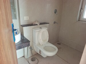 Bathroom in 3 BHK Apartment at Adani M2K Oyster Grande, Sector 102 – for Sale