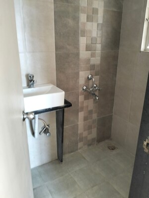 Bathroom in 2 BHK Apartment at Rama Celestial City, Ravet – for Rent