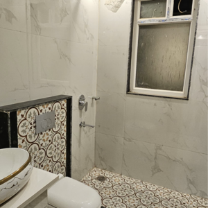 Bathroom in 4 BHK Builder Floor at Ansal API Esencia, Sector 67 – for Sale