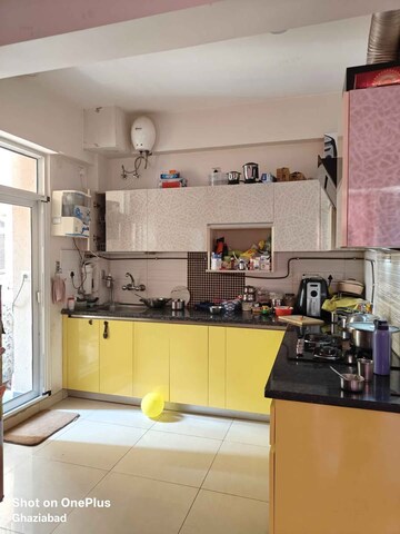 Kitchen in 2 BHK Apartment at Exotica Dreamville, Sector 16c Greater Noida – for Rent