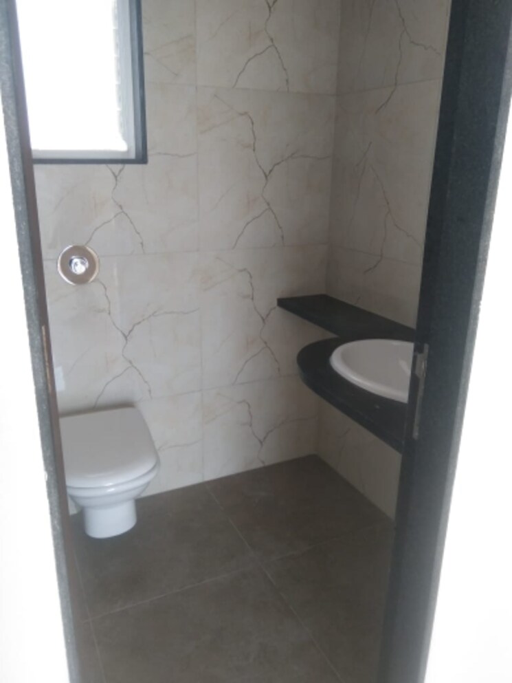 Bathroom, marvel-fria 2 Bedroom 955 Sq.Ft. Apartment In Wagholi Pune 8633470