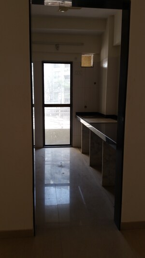 Kitchen in 1 BHK Apartment at RNA NG Paradise, Mira Road – for Sale