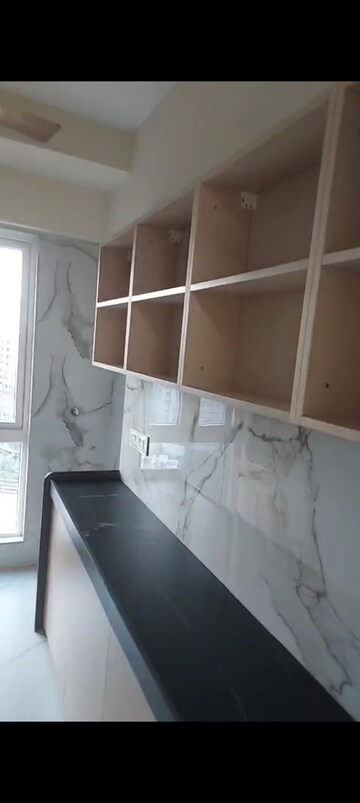 Kitchen in 1.5 BHK Apartment at Deraiya Iconico, Kurla East – for Rent