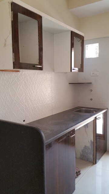 Kitchen in 1 BHK Apartment at Shree Ramdev Ritu Heights, Mira Road – for Sale