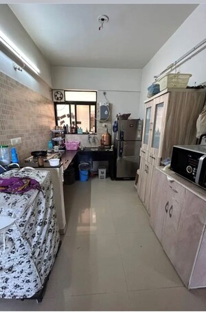 Kitchen in 2 BHK Apartment at Kolte Patil Margosa Heights, Mohammadwadi – for Sale