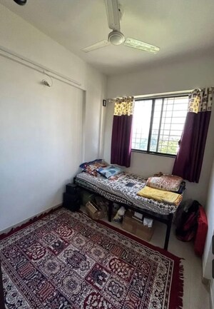 Bedroom in 2 BHK Apartment at Kolte Patil Margosa Heights, Mohammadwadi – for Sale