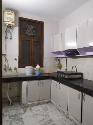 Kitchen in 3 BHK Apartment at Nehru Enclave – for Rent