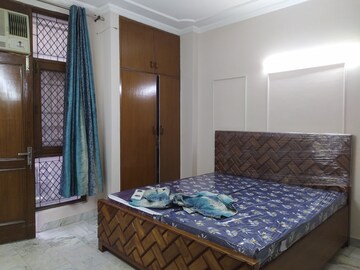 Bedroom in 3 BHK Apartment at Nehru Enclave – for Rent