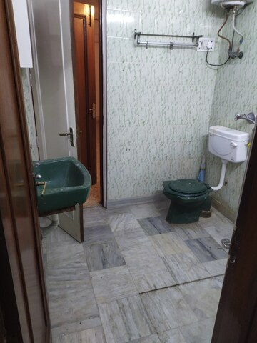 Bathroom in 3 BHK Builder Floor at Nehru Enclave – for Rent