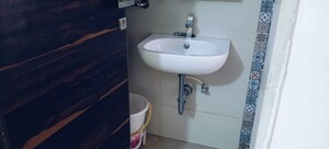 Bathroom in 3 BHK Apartment at Dhaval Sunrise Orlem, Malad West – for Sale