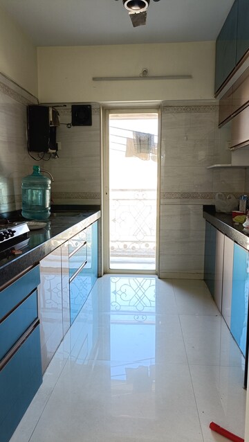 Kitchen in 2 BHK Apartment at Hiranandani Estate, Ghodbunder Road – for Rent