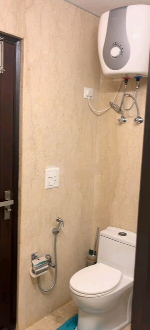 Bathroom in 2 BHK Apartment at Prateek Wisteria, Sector 77 – for Sale