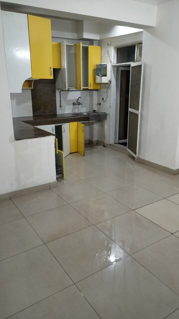 Kitchen in 2.5 BHK Apartment at Exotica Dreamville, Sector 16c Greater Noida – for Rent