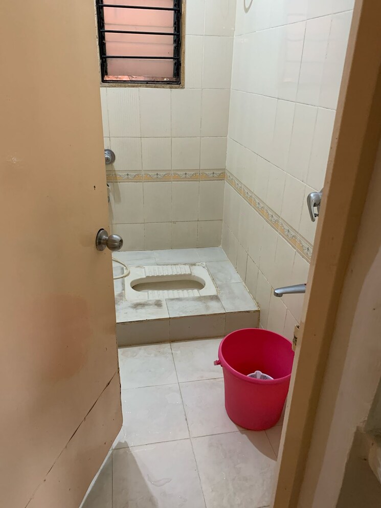 Bathroom, magarpatta-city-cosmos 2 Bedroom 980 Sq.Ft. Apartment In Magarpatta Road Pune 8634059