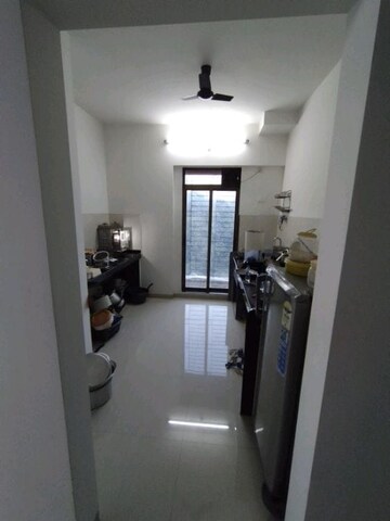 Kitchen in 2 BHK Apartment at Shree Satya Shankar Residency, Manpada – for Rent