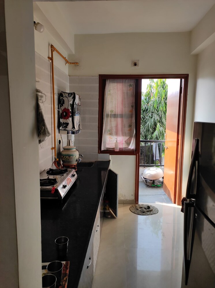 Kitchen, sun-real-home 2 Bedroom 107 Sq.Yd. Apartment In Ranip Ahmedabad 8633879