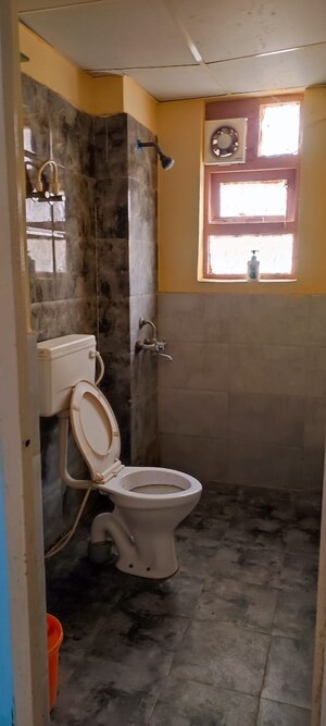 Bathroom in 1 BHK Apartment at Auric City Homes, Sector 82 – for Sale