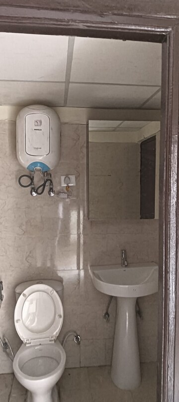 Bathroom in 3 BHK Apartment at Shri Radha Sky Gardens, Sector 16b Greater Noida – for Rent