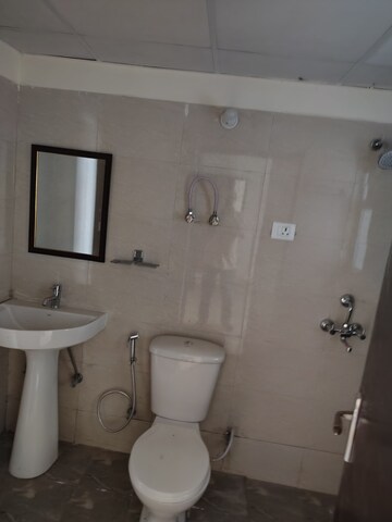 Bathroom in 3 BHK Apartment at Shri Radha Sky Gardens, Sector 16b Greater Noida – for Rent