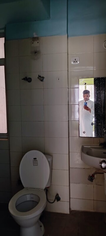 Bathroom in 2 BHK Apartment at Shiv Sai Ozone Park, Sector 86 – for Rent