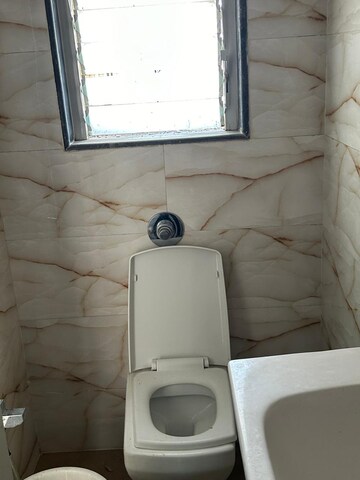Bathroom in 2 BHK Apartment at Sunbeam Heights, Andheri West – for Sale