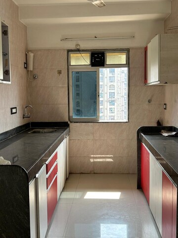 Kitchen in 2 BHK Apartment at Sunbeam Heights, Andheri West – for Sale