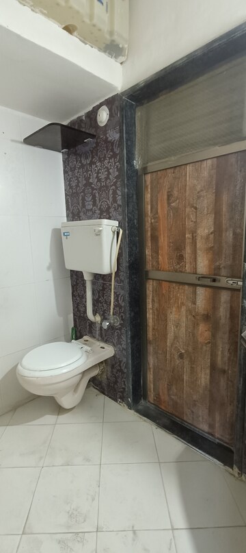 Bathroom in 2 BHK Apartment at La Gardenia CHS LTD, Mira Road – for Rent