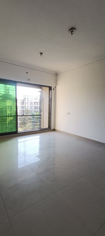 Living Room in 2 BHK Apartment at La Gardenia CHS LTD, Mira Road – for Rent
