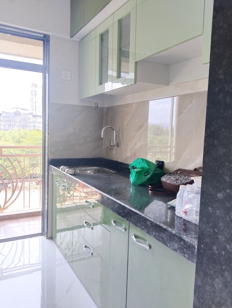 Kitchen, aura-luxisca 2 Bedroom 625 Sq.Ft. Apartment In New Panvel Navi Mumbai 8634304