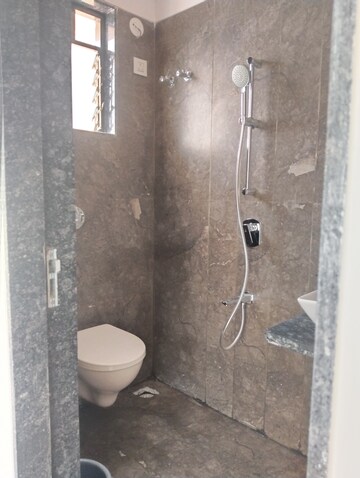 Bathroom in 2 BHK Apartment at Aura Luxisca, New Panvel – for Rent
