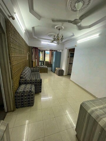 Living Room in 2 BHK Apartment at Vile Parle East – for Rent