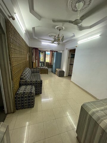 Living Room in 2 BHK Apartment at Vile Parle East – for Rent