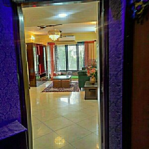 Living Room in 2 BHK Apartment at Krishna Godavari CHS, Malad East – for Sale