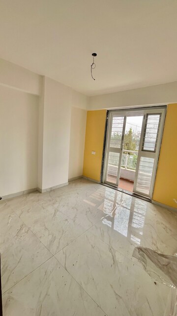 Bedroom in 2 BHK Apartment at Dhatrak Phata – for Sale