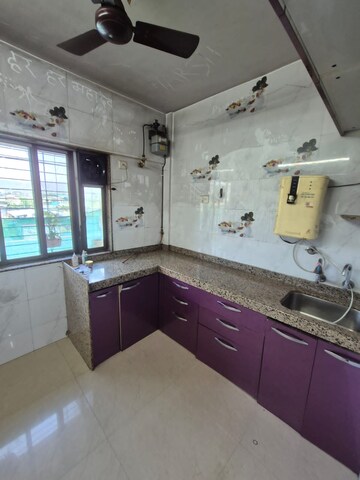 Kitchen in 2 BHK Apartment at Trishul Patel Heights, Ghansoli – for Rent