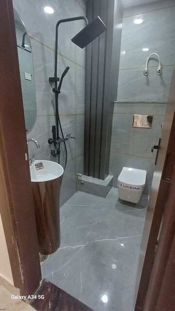 Bathroom in 2 BHK Apartment at Rama Park – for Sale