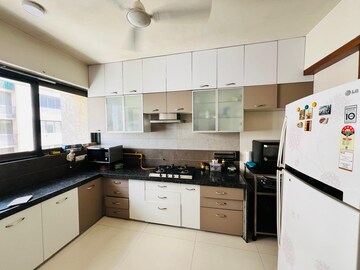 Kitchen in 4 BHK Apartment at Prahlad Nagar – for Sale