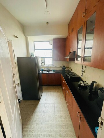 Kitchen in 3 BHK Apartment at Prateek Grand City, Siddharth Vihar – for Rent