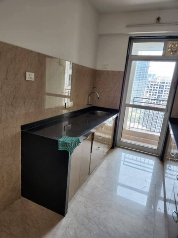 Kitchen in 2 BHK Apartment at Chirag Bhagat Grandeur, Malad West – for Rent