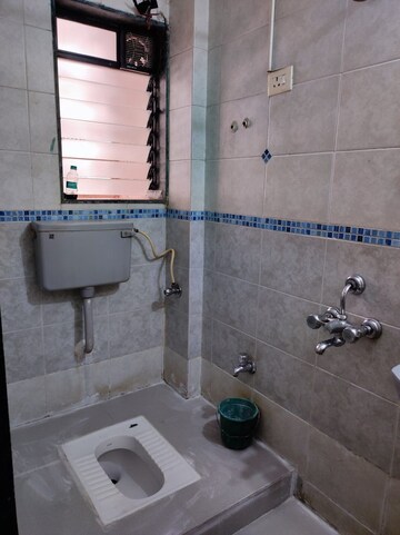 Bathroom in 2 BHK Apartment at Shah Arcade, Kharghar – for Rent