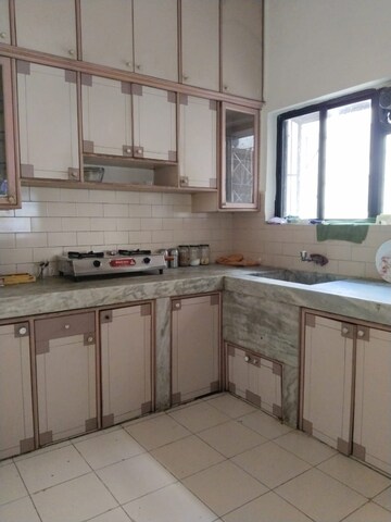 Kitchen in 2 BHK Apartment at Moghul Garden, Koregaon – for Rent